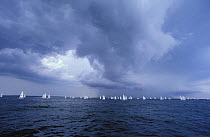 Thunder clouds build over the Laser dinghy fleet at the 1996 Atlanta Olympics, Savannah, Georgia. USA 1996.  Editorial Use Only.