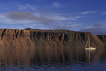 88ft sloop "Shaman" anchored in Spitsbergen under midnight sun light at 2.00am, Svalbard, Norway 1998.