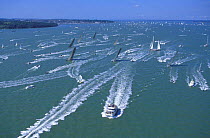 A fleet of IACC (International Americas Cup Class) yachts start the Round the Island race during the America's Cup Jubilee held off Cowes, Isle of Wight, England 2001.