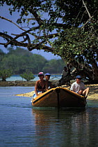 Exploring in an inflatable boat around Espiritu Santo Island, Vanuatu, South Pacific, 1993.