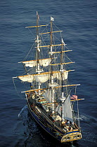 Tall ship "Bounty" motoring in calm conditions off Newport, Rhode Island, USA