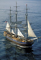 Tall Ship "Bounty" motoring in calm conditions off Newport, Rhode Island, USA