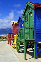 Colourful beach huts at St James beach in False Bay, Cape Town, South Africa.