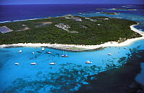 Aerial view of boats moored off one of the many deserted islands that dot the coast of Puerto Rico, Caribbean. ^^^Rich aquatic life and coral reef make these areas popular with snorkellers and scuba d...