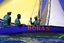 Dinghy "Boras" racing in the Grenada Sailing Festival workboat division.