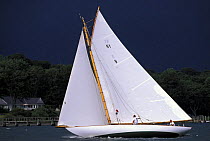 New York 30 "Amorita" sailing on Narragansett Bay beneath a stormy sky, Rhode Island, USA. Property Released.