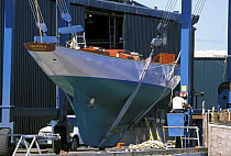 12 metre "Onawa" in the travel hoist at Newport Shipyard, USA.