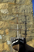 Model of a ship above a door entrance in Nelson's Dockyard, Antigua, Caribbean.