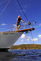 Checking the anchor of "Bright Star", Caribbean.