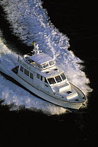 Alden 38 powerboat cruising.