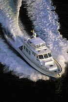 Alden 38 powerboat motoring.