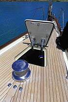 Open foredeck hatch and winch are on luxurious 140ft superyacht "Rebecca".