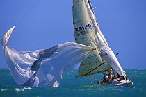 Spinnaker flying free after being released too early in a windy broach, Key West Race Week, Florida, USA.