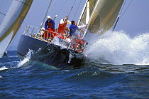 Boomerang approaching the weather mark as the crew prepare to set the spinnaker, Newport, Rhode Island, USA.