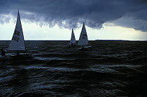 Storm clouds over the Laser dinghy class during the Atlanta Olympics in Savannah, Georgia, USA, 1996.  Editorial Use Only.