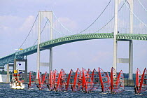 Mistral class windsurfing race start during the Youth World Championships under the Newport Bridge, Rhode Island, USA