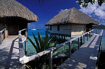 Huts of the Bora Bora Pearl hotel on the Bora Bora lagoon, French Polynesia