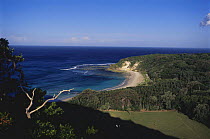 View from cliff-top of sandy bay on Lord Howe Island, New South Wales, Australia.