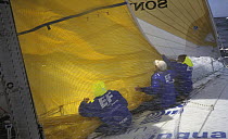 Sail change aboard "EF Education" during leg 1, Whitbread Round the World Race, 1997-8.