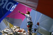 Bowman of a yacht prepares for a gybe downwind, Admiral's Cup, 1989.