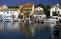 Houses on the waterside in Fiskardo, Cefalonia, Greece.