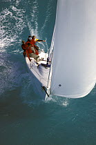 Melges 24 "Zenda Express" surfs downwind under assymetric spinnaker at Key West, 2000.