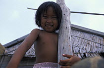 Baju girl in front of her house on the southern tip of Walea island, Sulawesi, Indonesia.