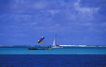 Preparing to parasail, Mauritius. 2002