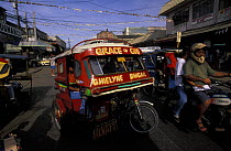 Tuk tuk / auto rickshaw in the streets of Puerto Princesa, Philippines. 2001
