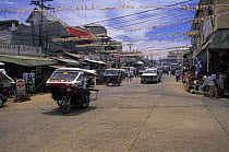 Tuk tuks in the streets of Puerto Pricessa, capital of Palawan, Philippines.
