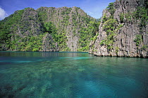 Limestone cliffs at Kayangan Lake / The Blue Lagoon, Coron Island, Northern Palawan, Philippines.