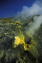 Sulphuric gases coming out of a fumerole next to the big crater (Fossa di Vulcano) on Vulcano, Aeolian Islands, Italy.