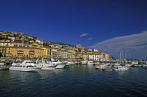 Boats moored in the coastal harbour town of Porto Santo Stefano, situated on Italy's Argentario promontory, west coast of Italy.