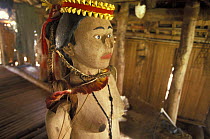 A statue to honour the Mipsil that used to live in this men's house (faluw). Yap, Micronesia. ^^^It was a Mispils solemn duty to attend to all needs of the men of the mens house in which she resided.