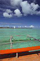 Pirogue boat in Baie d'Upi, Ile de Pins, New Caledonia, South Pacific.