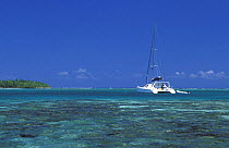 Catamaran at anchor in the Sapodilla Cays, Belize.