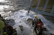 Crew in rough conditions on "The Card" in the Southern Ocean during the Whitbread Round the World Race, 1989-90.