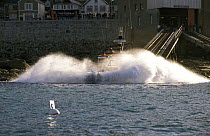 Sennon Cove launch their Mersey Class lifeboat, near Lands End, Cornwall, UK.