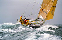 Intrum Justitia racing in the Round the World Race, 1993-94. ^^^Skippered by British yachtsman Lawrie Smith the team won the second leg of the race and broke a record in the process.