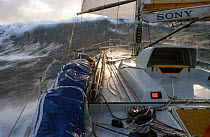 Intrum Justicia moving through the Southern Ocean under spinnaker during the Whitbread Round the World Race, 1993.