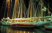 40 metre classic Schooner "Orion", a 1910 Charles Nicholson design, moored in St Tropez harbour next to the owner's speedboat, also called "Orion", La Nioulargue 1991.