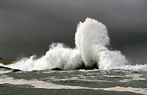 Wave breaks on the rocks near Valentia, south west Ireland.
