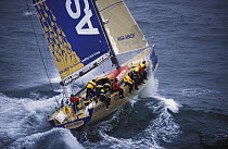 VO 60, "Assa Abloy", with crew weight to windward during the Volvo Ocean Race, 2001-02.