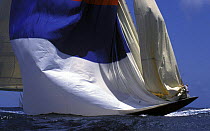 Jib is hoisted before dropping the spinnaker aboard the J-Class "Velsheda" at Antigua Classic Yacht Regatta, 1999.