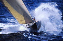 J-Class "Velsheda" takes a wave broadside on at Antigua Classics, 2001.