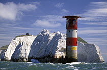 Lighthouse marking the Needles rocks off the west coast of the Isle of Wight, UK.