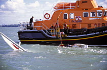 Torbay's Severn Class lifeboat rescues a Sonar during a blustery Cowes Week, UK, 2001. ^^^ The lifeboat was brand new and still in the Solent for her commissioning period before going to her permanent...