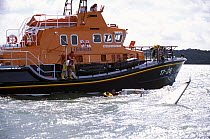 Torbay's Severn Class RNLI lifeboat rescues a Sonar during a blustery Cowes Week, 2001. ^^^ The lifeboat was brand new and still in the Solent for her commissioning period before going to her permanen...