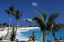 Flight landing over Maho Beach on St Maarten, Caribbean.
