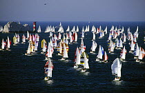 Fleet taking part in the annual Round the Island Race arrive at the Needles, Isle of Wight, UK, 1997.